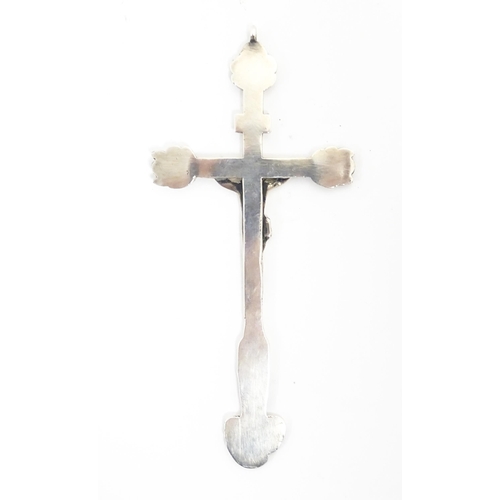 1091 - A 19thC white metal crucifix / pendant depicting Christ / Corpus Christi in relief above the Virgin ... 