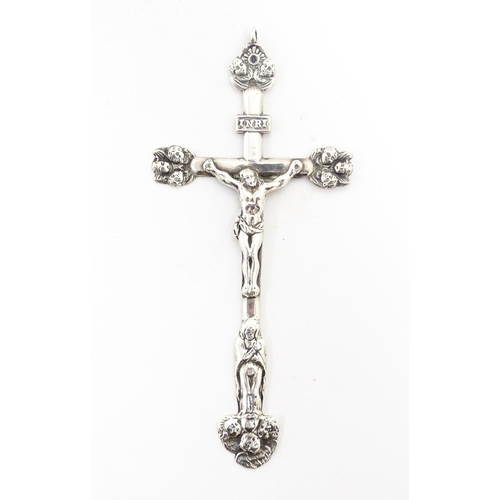 1091 - A 19thC white metal crucifix / pendant depicting Christ / Corpus Christi in relief above the Virgin ... 