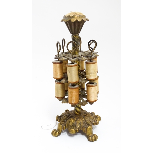 Sewing Interest: A Victorian brass two tier cotton reel / thread stand /  holder, the cast base with