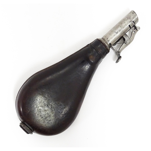 1110 - A late 19thC shot flask, the steel spout with measures for 1 and 1 1/4oz shot, the leather pouch wit... 