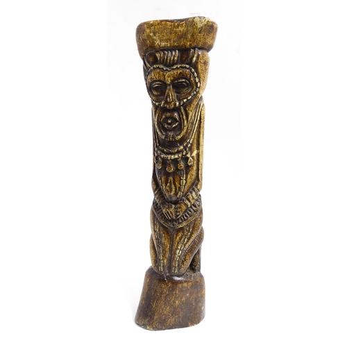 1124 - Ethnographic / Native / Tribal: An African Yoruba tribal carved water buffalo thigh bone with figura... 