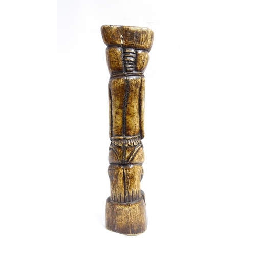 1124 - Ethnographic / Native / Tribal: An African Yoruba tribal carved water buffalo thigh bone with figura... 