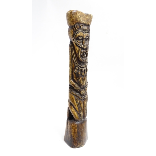 1124 - Ethnographic / Native / Tribal: An African Yoruba tribal carved water buffalo thigh bone with figura... 