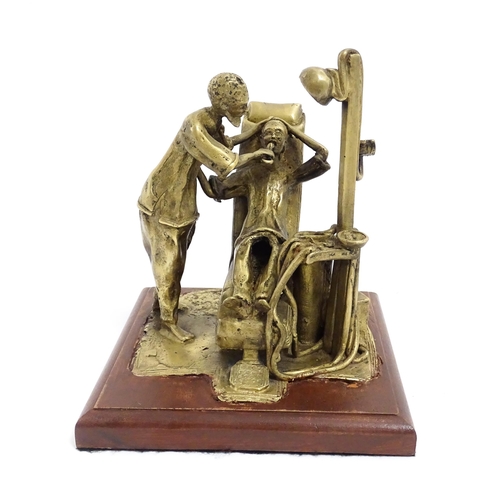 1025 - A 20thC brass sculpture depicting dentist and patient, with a wooden base. Approx. 8 3/4