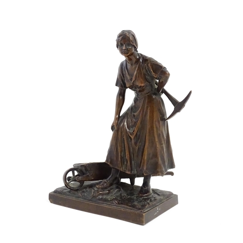 1029 - A 20thC cast sculpture depicting a female miner with an axe and a wheelbarrow of coal. Numbered 6129... 