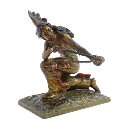 1030 - An Austrian cold painted bronze modelled as a Native American Indian with a bow and arrow. Approx. 3... 