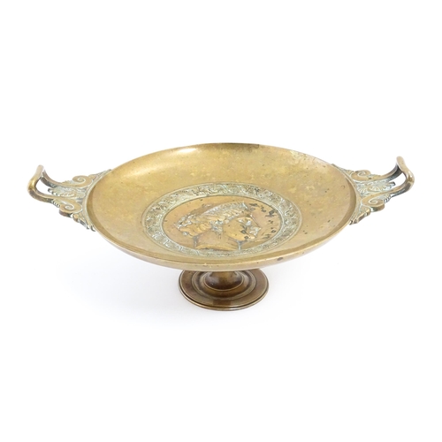 1044 - A 19thC French bronze twin handled tazza depicting a relief profile portrait of Juno titled JVNON, t... 