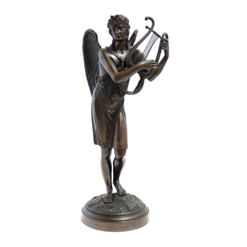 1046 - A bronze sculpture depicting Apollo playing a lyre. Approx. 21