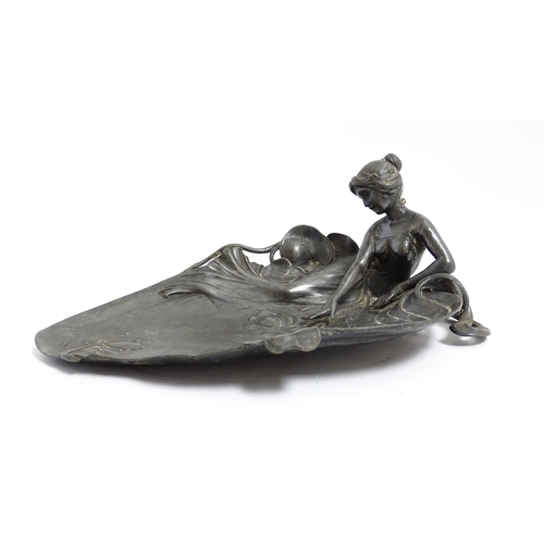 1050 - A WMF Art Nouveau figural pewter dish modelled as a maiden beside a pond with lily pads. Marked unde... 