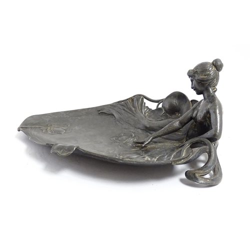 1050 - A WMF Art Nouveau figural pewter dish modelled as a maiden beside a pond with lily pads. Marked unde... 