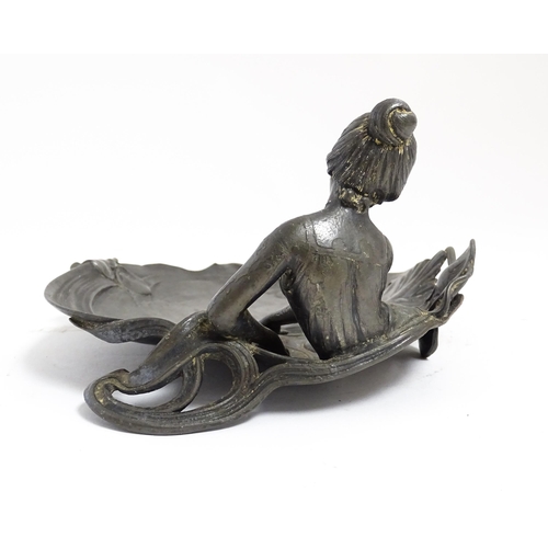 1050 - A WMF Art Nouveau figural pewter dish modelled as a maiden beside a pond with lily pads. Marked unde... 