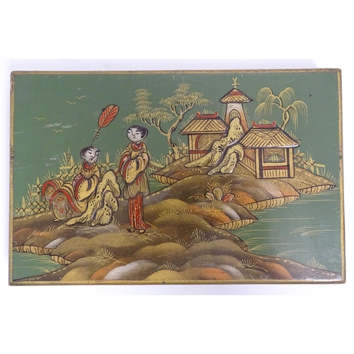 1068 - A 20thC cigarette box with chinoiserie decoration depicting two figures in a landscape with pagoda s... 