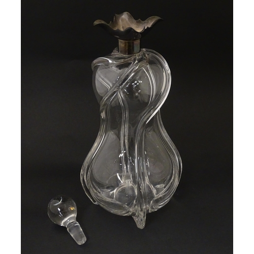 249 - A Victorian shaped glass decanter with trail detail, with silver collar hallmarked London 1896, make... 