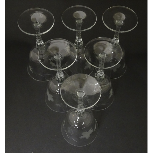 252 - A 20thC glass decanter with etched fruiting detail. Together with six matching drinking glasses. Dec... 