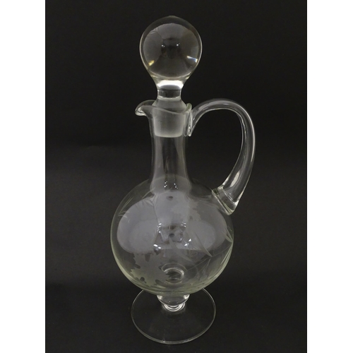 252 - A 20thC glass decanter with etched fruiting detail. Together with six matching drinking glasses. Dec... 