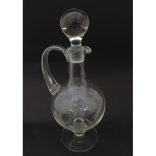 252 - A 20thC glass decanter with etched fruiting detail. Together with six matching drinking glasses. Dec... 