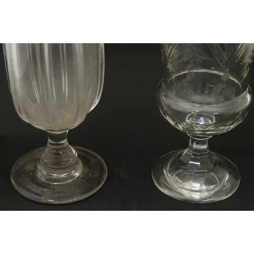 254 - Two Victorian pedestal glass vases / celery vases, one with flared rim, the other with etched decora... 