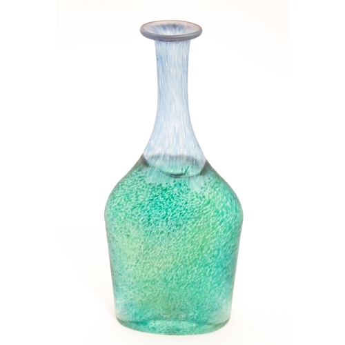 255 - Scandinavian Art Glass: A glass bottle with iridescent green and blue detail by Bertil Vallien for K... 