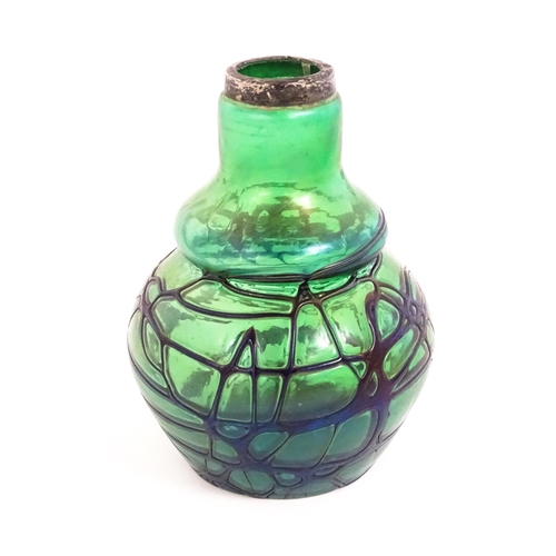 258 - An Art Nouveau green art glass vase with blue iridescent trail detail with silver rim, hallmarked Bi... 