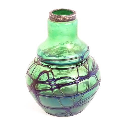 258 - An Art Nouveau green art glass vase with blue iridescent trail detail with silver rim, hallmarked Bi... 