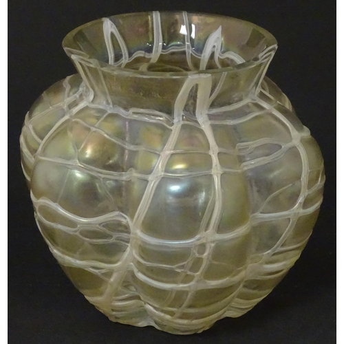 265 - An early 20thC Art Nouveau art glass vase of lobed form with trail and lustre detail. In the manner ... 