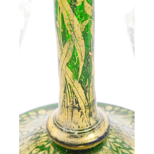 274 - A Victorian green glass table lustre with gilt foliate decoration and clear glass drops. Approx 13 1... 