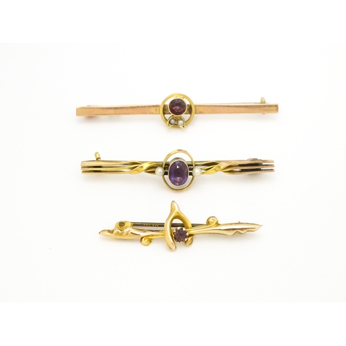 676 - Three 9ct gold bar brooches two set with amethyst and one set with garnet. The largest 2