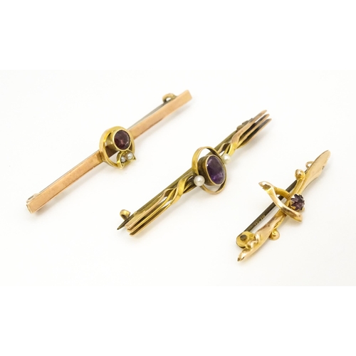 676 - Three 9ct gold bar brooches two set with amethyst and one set with garnet. The largest 2