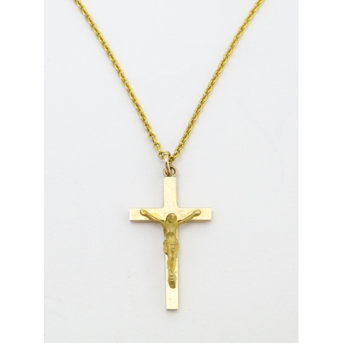 686 - A 9ct gold crucifix pendant approx 1