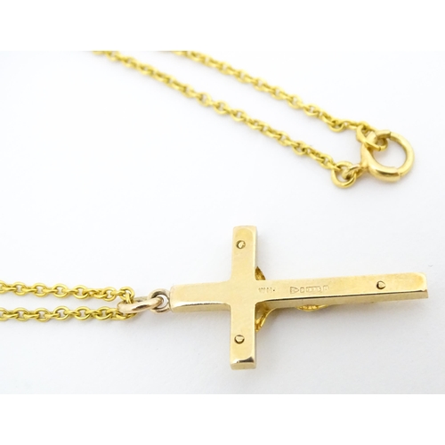 686 - A 9ct gold crucifix pendant approx 1