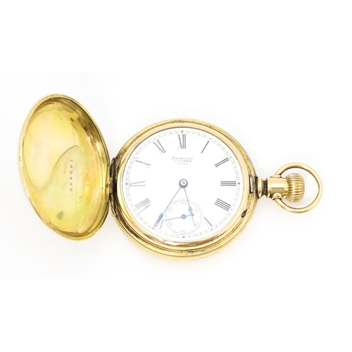 776 - A gold plated Waltham hunter pocket watch, the dial with Roman numerals and subsidiary seconds dial.... 