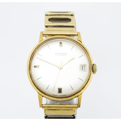 A gentleman s Junghans wristwatch with date aperture at 3 and