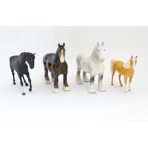 120 - Four Beswick models of horses comprising a brown Shire Mare and a dapple grey Shire Mare model no. 8... 