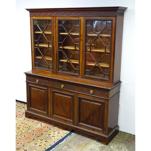 1438 - A late 19thC mahogany glazed bookcase by S & H Jewell, Queen Street, London. The cornice with blind ... 