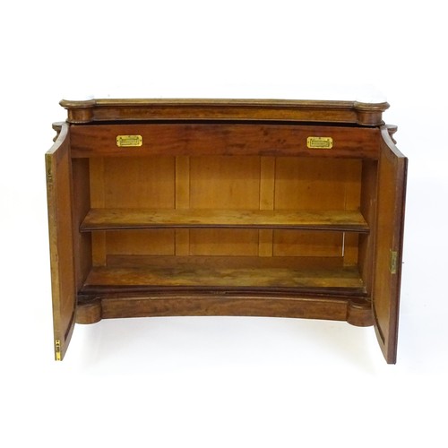 1440 - A 19thC mahogany marble topped sideboard of concave form, the marble top matching the castellated fr... 