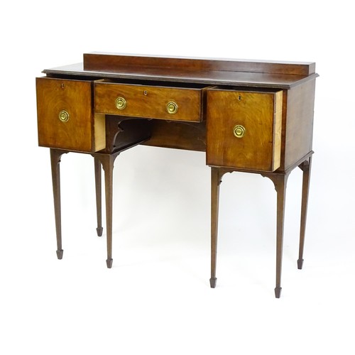 1445 - A 19thC mahogany sideboard, having a raised upstand above a moulded top edge and small central drawe... 