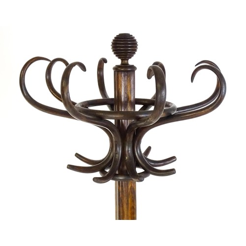 1452 - A late 19thC / early 20thC large Thonet bentwood hat stand / coat stand / stick stand, with eight S-... 