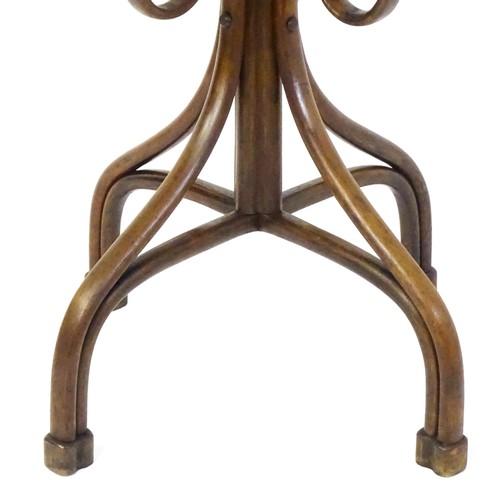 1452 - A late 19thC / early 20thC large Thonet bentwood hat stand / coat stand / stick stand, with eight S-... 