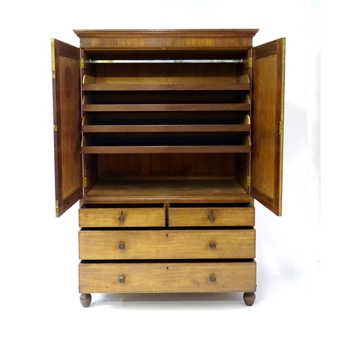 1459 - An early 19thC mahogany Gillows linen press with a moulded cornice above four slides and the base co... 