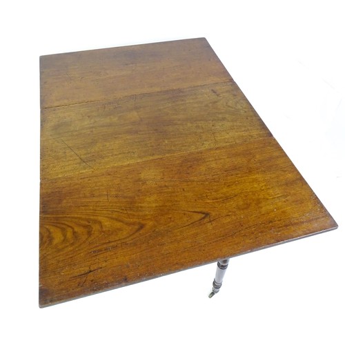 1483 - A Georgian mahogany drop flap table, with a rectangular top and two rectangular drop leaves, the tab... 