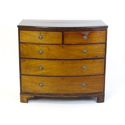 1495 - A late 19thC mahogany bow fronted chest of drawers with two short over three long graduated drawers ... 