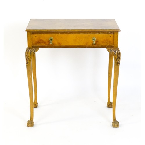 1501 - A 20thC Queen Anne style side table with a burr walnut veneered top above a single long drawer raise... 