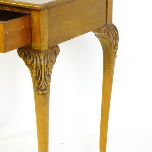 1501 - A 20thC Queen Anne style side table with a burr walnut veneered top above a single long drawer raise... 