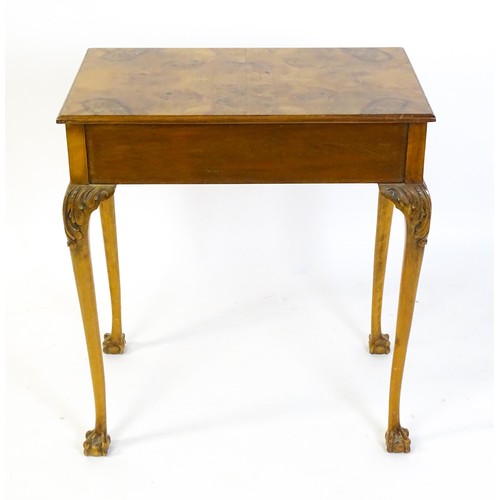 1501 - A 20thC Queen Anne style side table with a burr walnut veneered top above a single long drawer raise... 