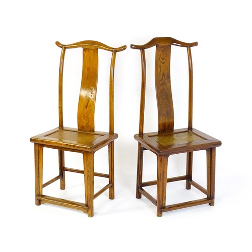 1518 - Two 19thC Chinese elm yoke back chairs, with shaped top rails, bowed mid rails and a rushed seat abo... 