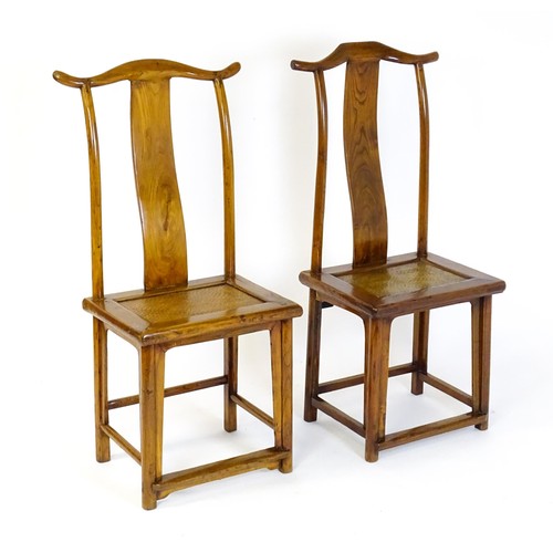 1518 - Two 19thC Chinese elm yoke back chairs, with shaped top rails, bowed mid rails and a rushed seat abo... 