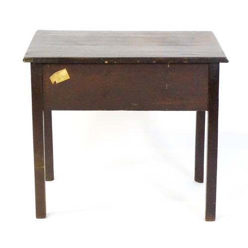 1527 - A Georgian mahogany low boy with a moulded top above a single long drawer with swan neck handles, th... 