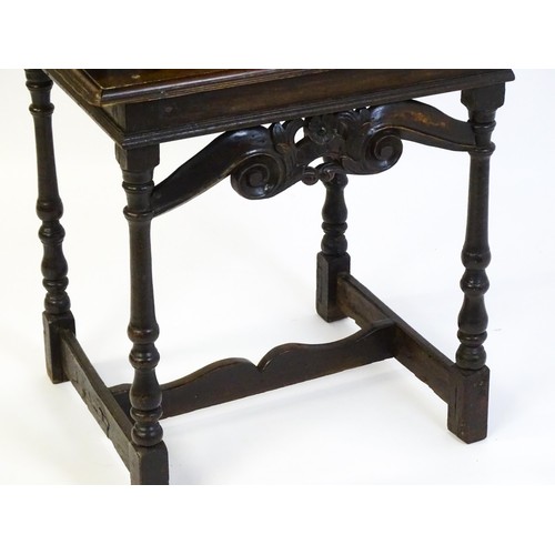 1552 - A Victorian oak cabinet on stand. A 19thC table cabinet with carved lozenge decoration , six short d... 