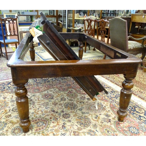 1559 - A 20thC oak combination dining / snooker table, with revolving mechanism and slate base, approx 84 1... 