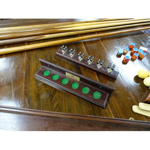 1559 - A 20thC oak combination dining / snooker table, with revolving mechanism and slate base, approx 84 1... 